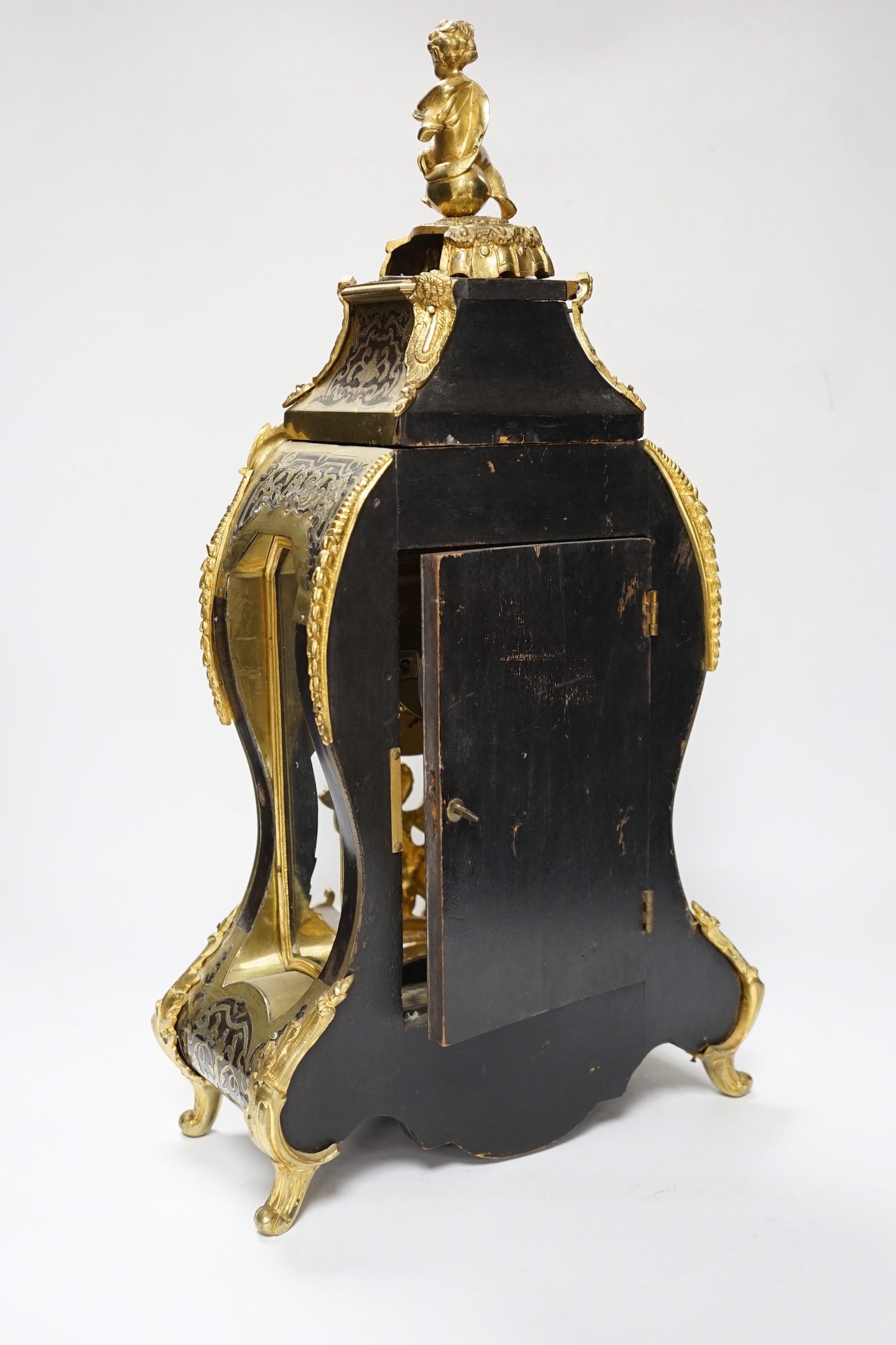 A large Louis XV style cut brass inlaid mantel clock, with a two train, French movement, striking on a bell, 50cm high